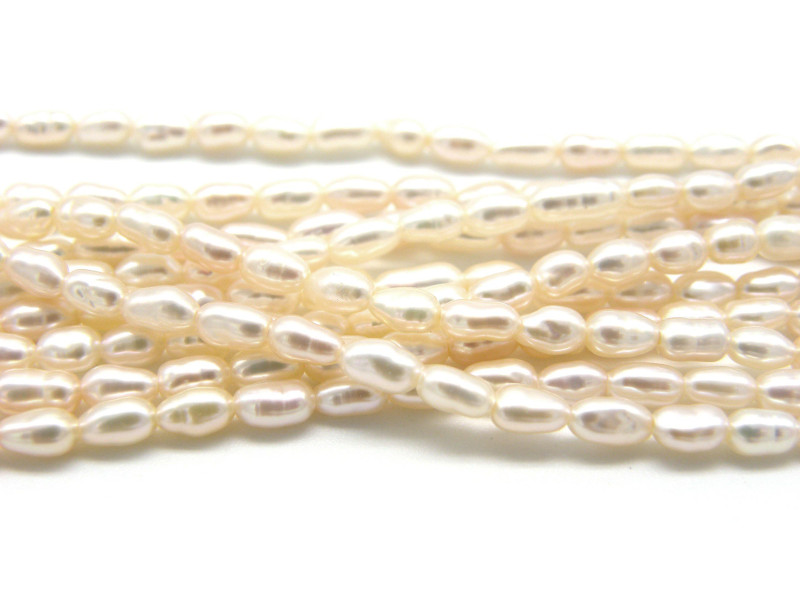 Kleine ovale Süßwasserzuchtperlen 2,5 x 4 mm - Cremefarben