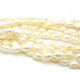 4 - 6 mm Baroque Irregular Rice-shaped Freshwater Cultured Pearls - White (20 Pearls)